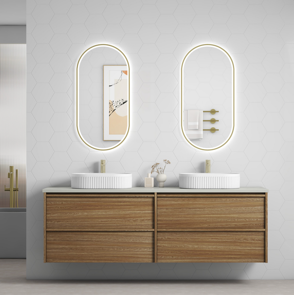 A modern 1800mm bathroom vanity with two oval backlit mirrors, white ceramic bench mount basins, a light wood floating cabinet.