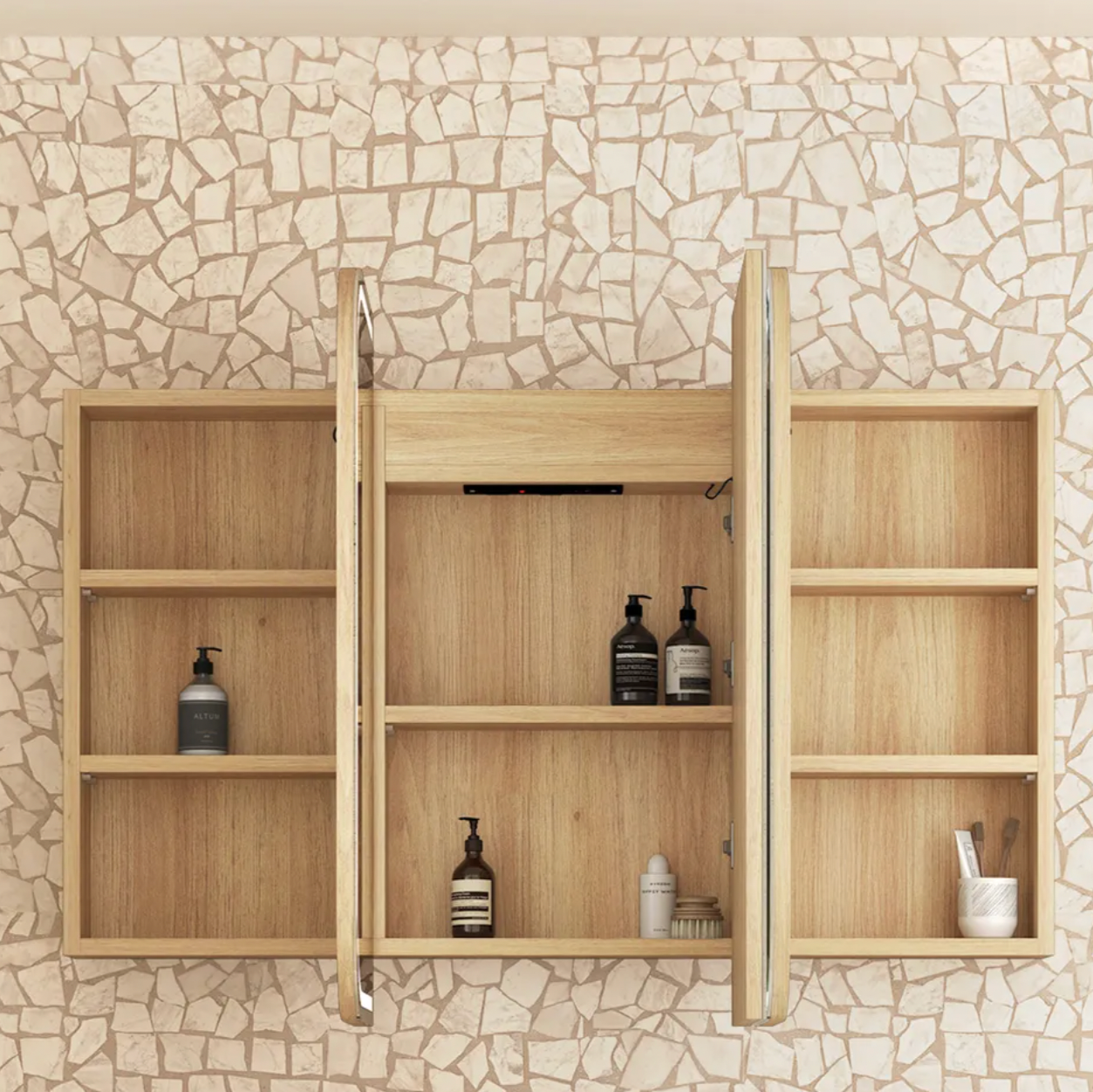 Wooden wall-mounted cabinet with shelves against a mosaic tile wall.