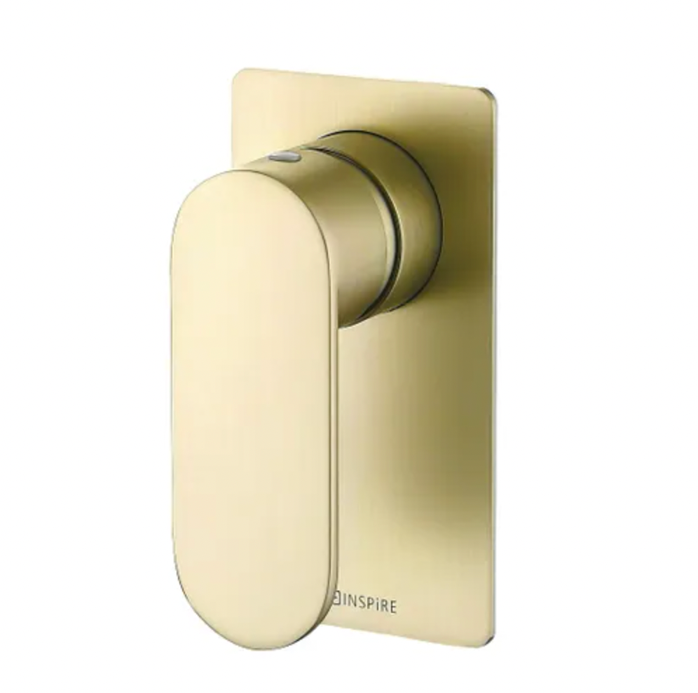 A brushed gold Vetto shower mixer with a soft oval handle, from the Inspire brand, viewed from the side.