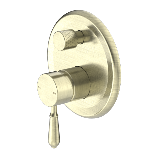 A aged brass shower mixer with diverter, featuring a large circular aged brass body and a smaller, matte push button diverter .