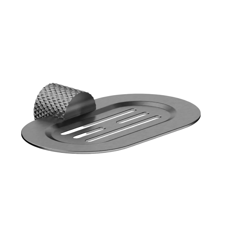 A graphite soap dish with a textured, pebble-like desig and three elongated drainage slots on the top.