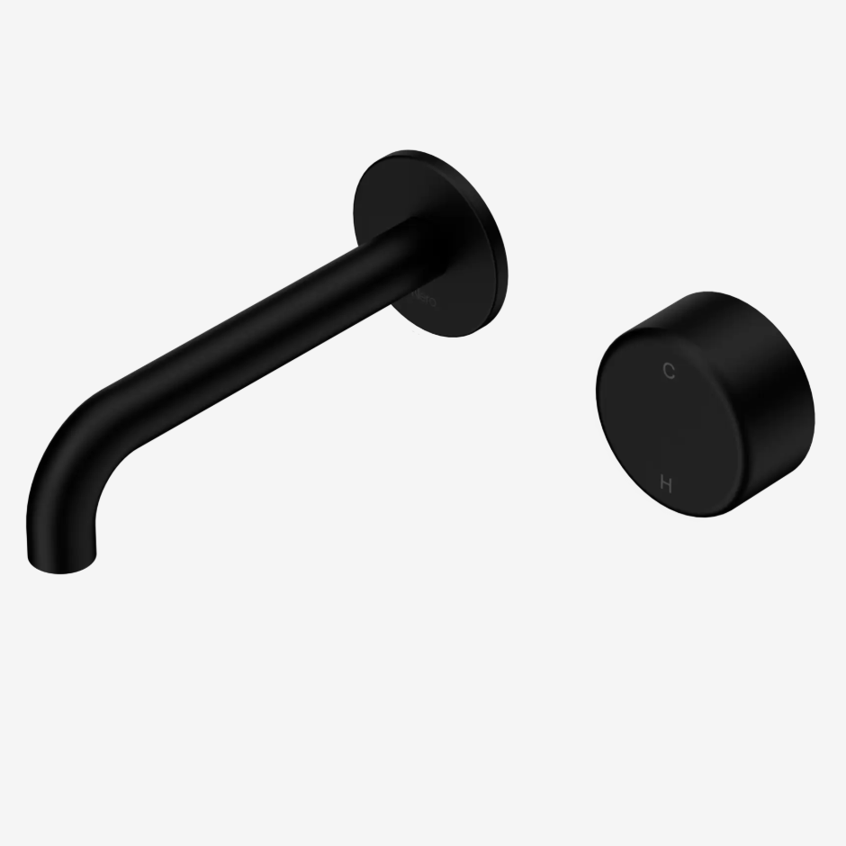 A matte black wall-mounted spout with a matching round progresive control water mixer handle.