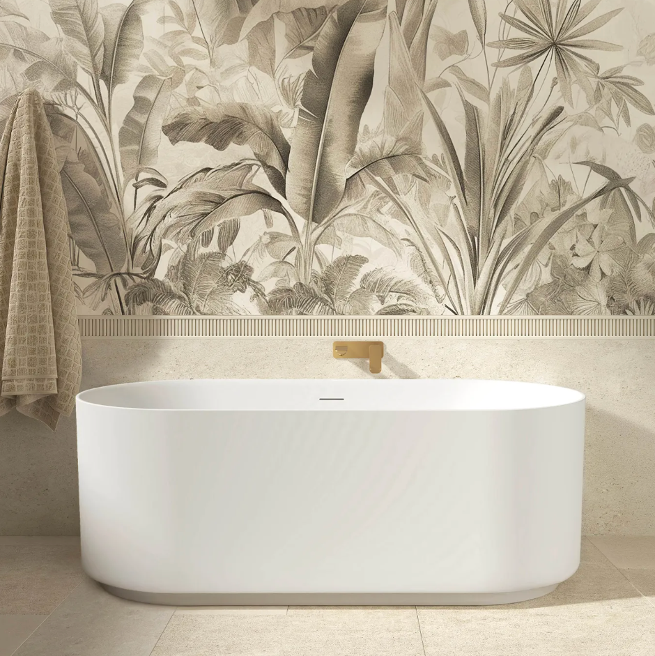 White freestanding bathtub in a bathroom with overflow and shadowline 