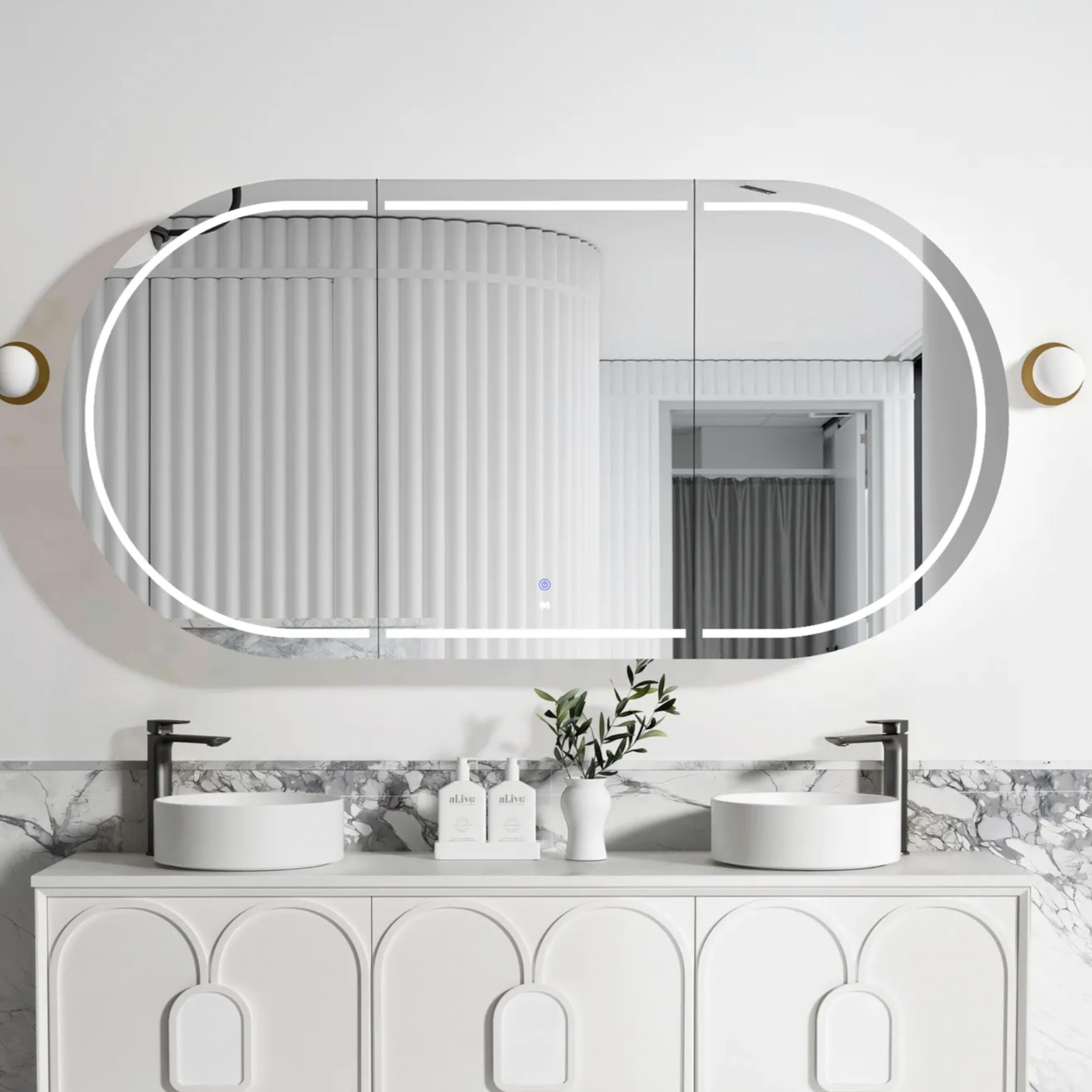 Bathroom vanity with a large oval mirror and decorative elements.
