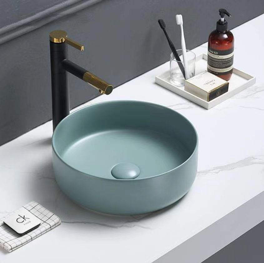 matte green round above bench basin