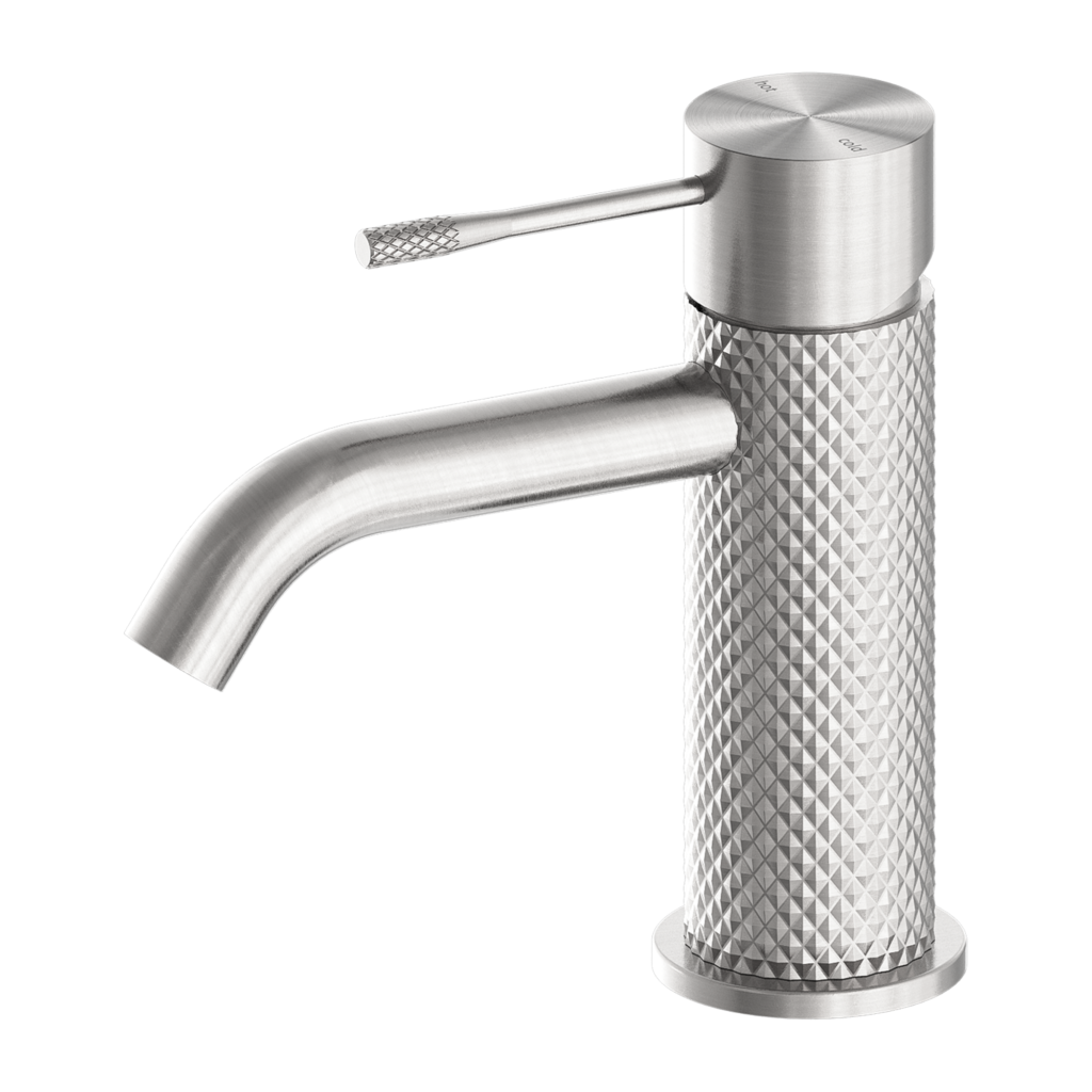 A modern brushed nickel basin mixer tap with a distinct knurling feature and a sleek, curved spout.