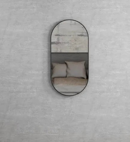 Oval framed matte black bathroom mirror