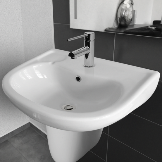 wall hung care bathroom basin with shroud and overflow 