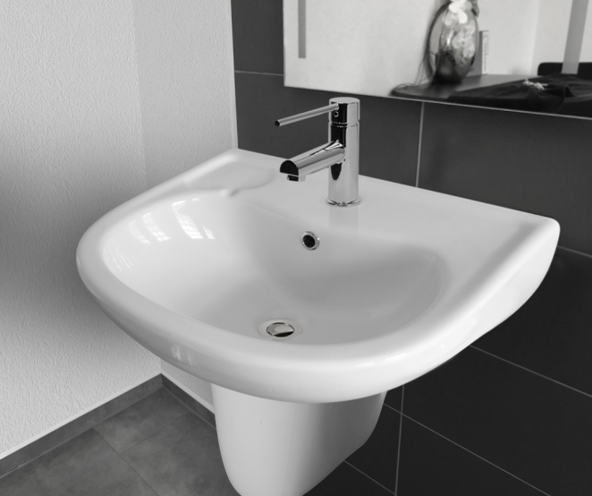 wall hung care bathroom basin with shroud and overflow 